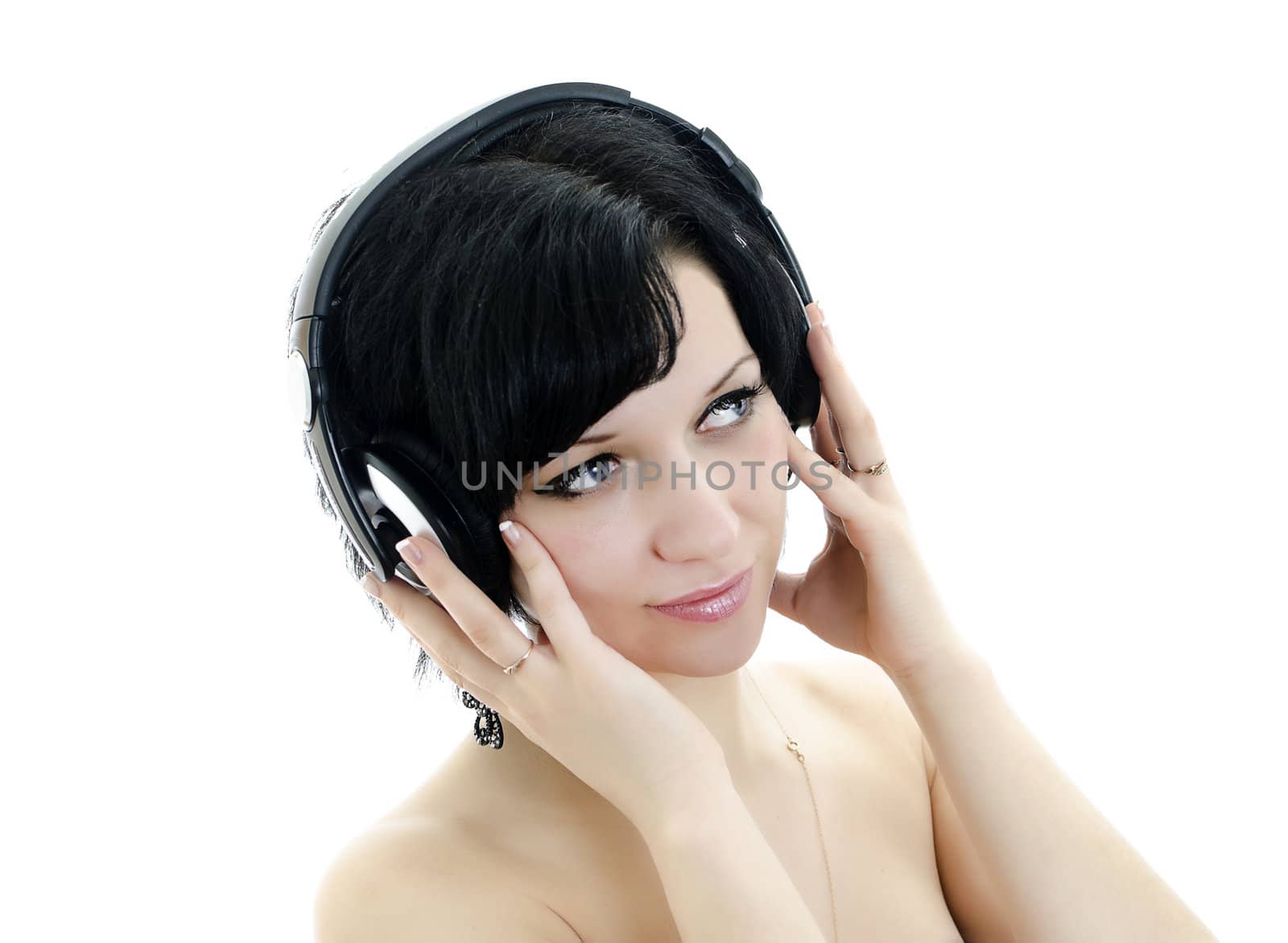 Close-up portrait of brunette woman with headphones, isolated over white background