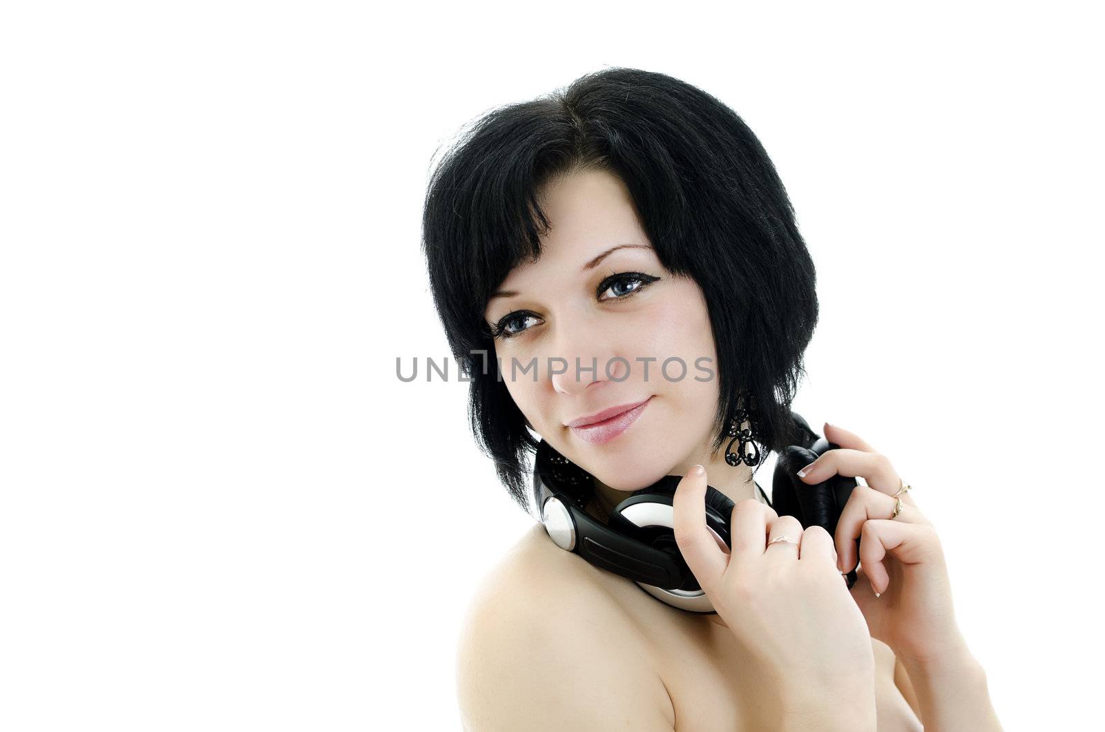 Close-up portrait of brunette woman with headphones, isolated over white background