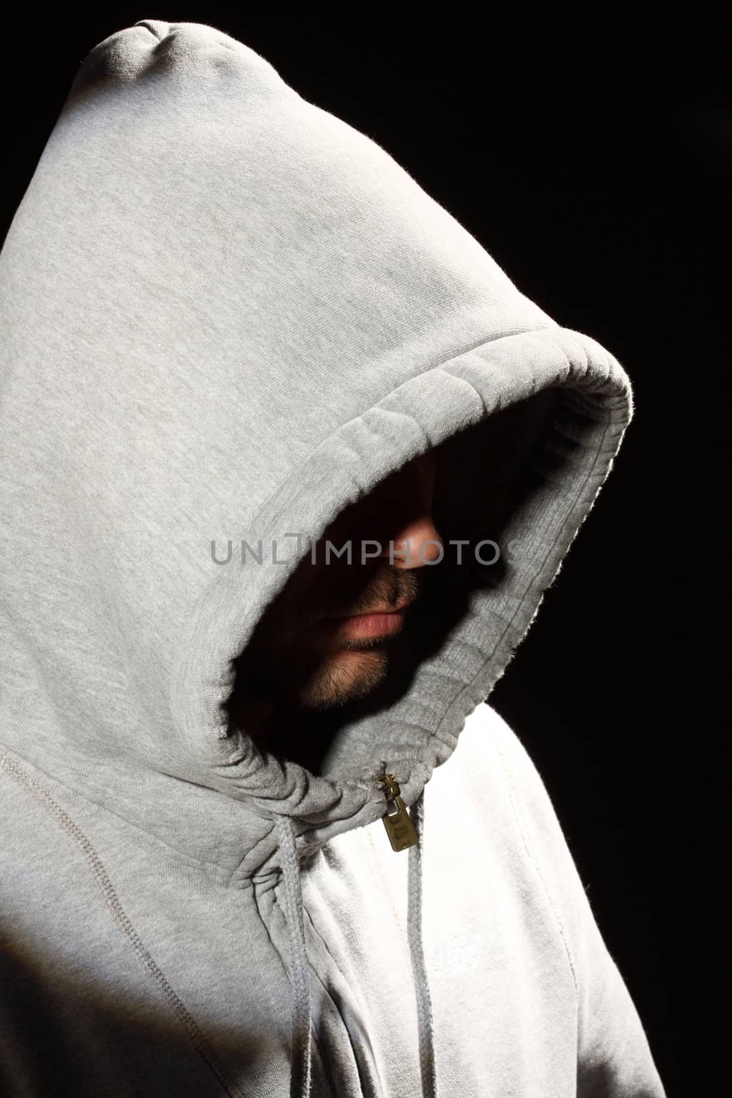 Portrait of a young man in a hood 