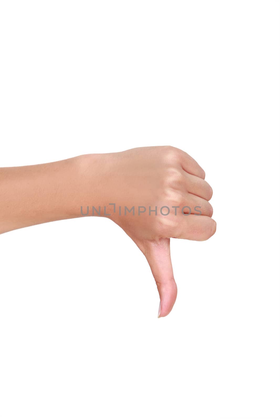 Female hand with thumb down by phovoir