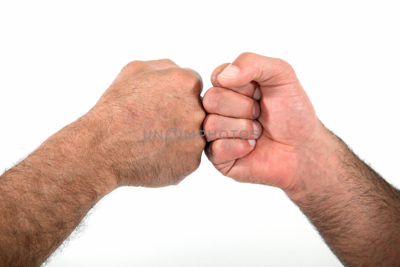Two men bumping fists by phovoir