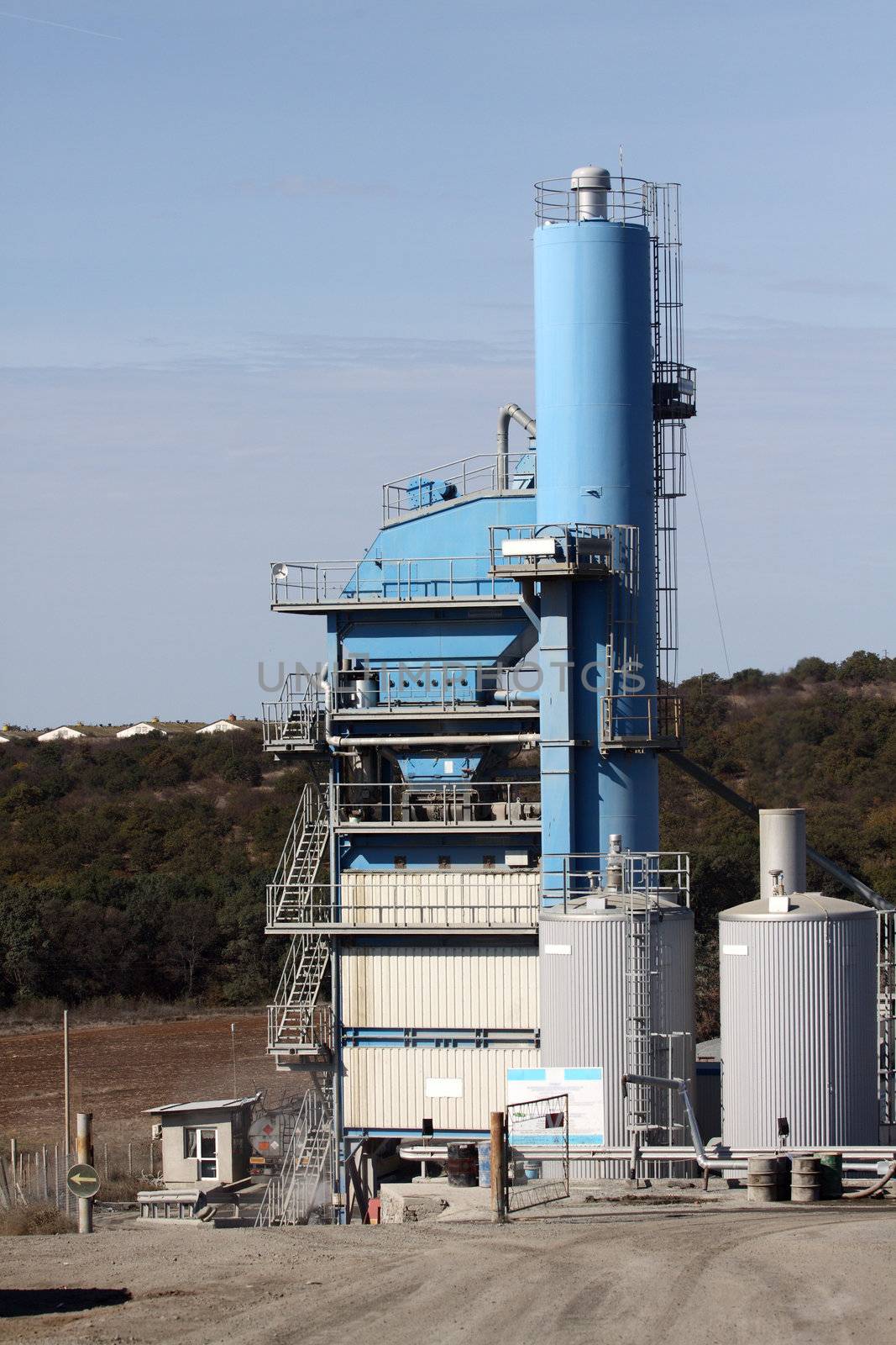 View of stone quarry with silos 