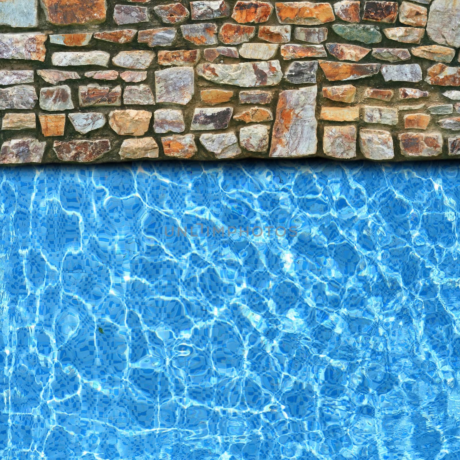 irregular stone pavement with pool edge background