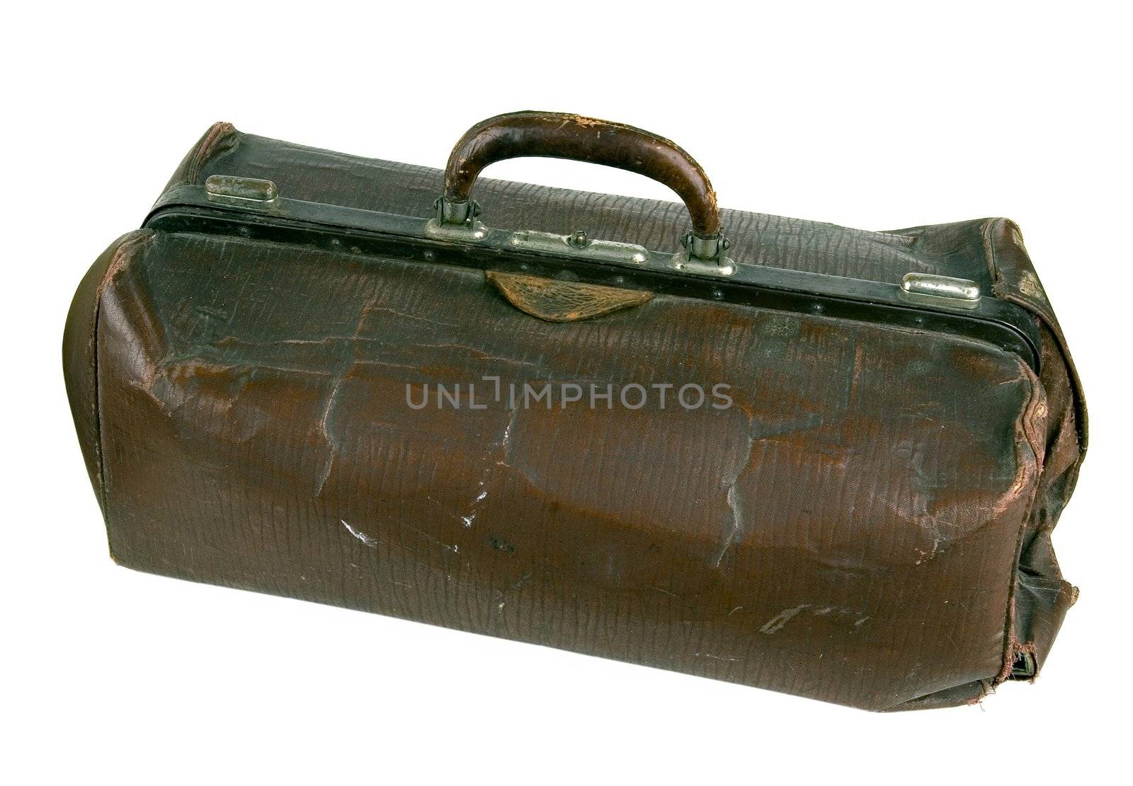 Old brown suitcase on a light background