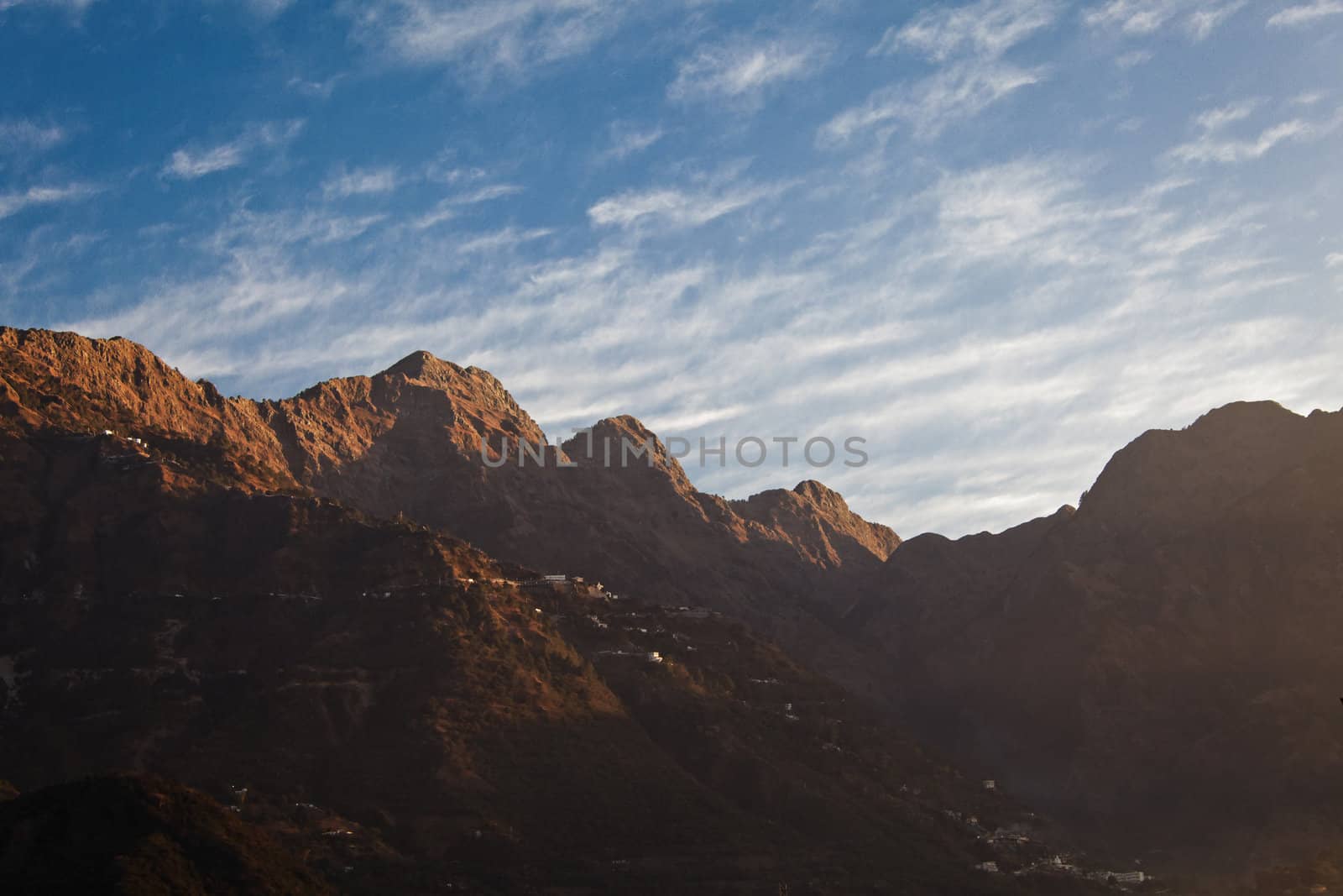 From Katra in Jammu Kashmir, side of the Trikuta peaks defining the 14 kilometer footpath and pony trail up the side of the mountain to Vaishno Devi Temple, a shrine and and popular Hindu pilgrimage