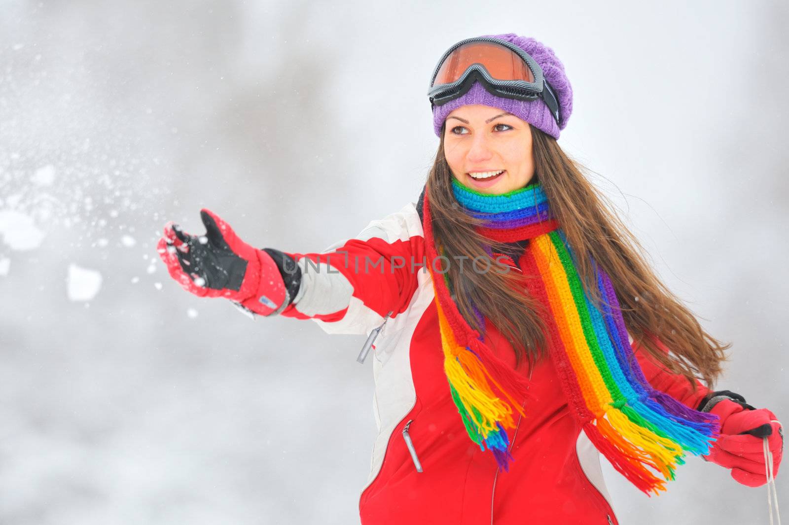 Young Beautiful Woman play in winter time by jordachelr