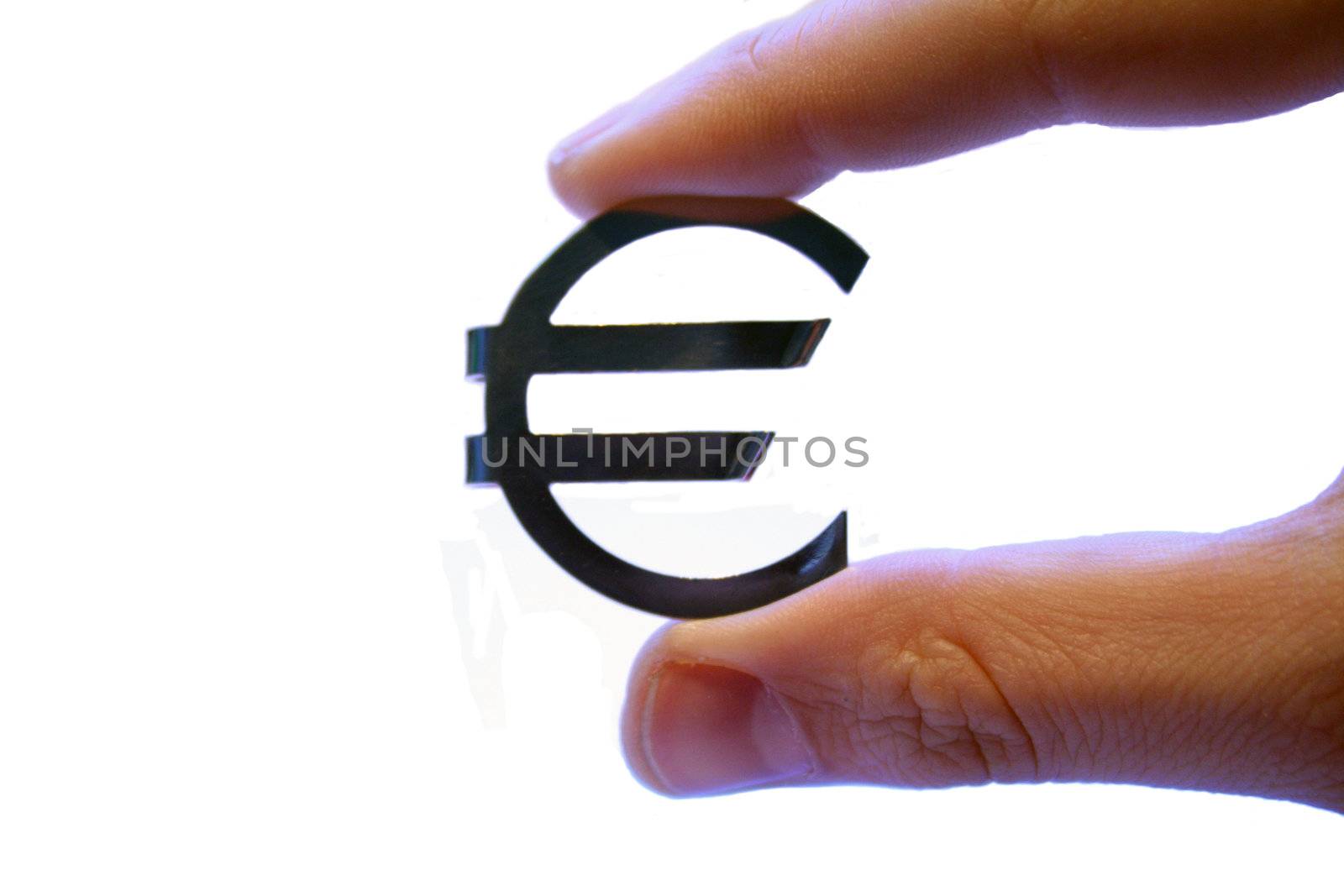 A human hand holding an Euro sign. All isolated on white background.