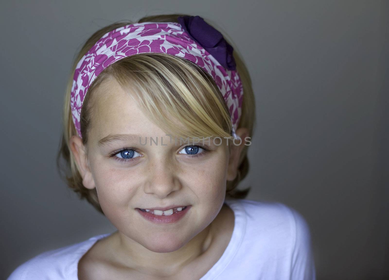 Smiling girl with hairband by annems