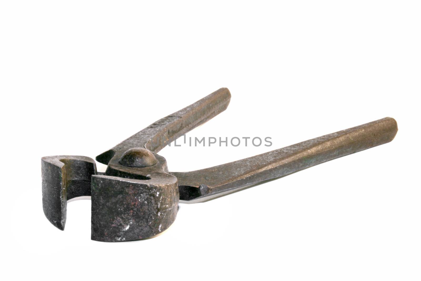 An old rusty claw. All isolated on white background.