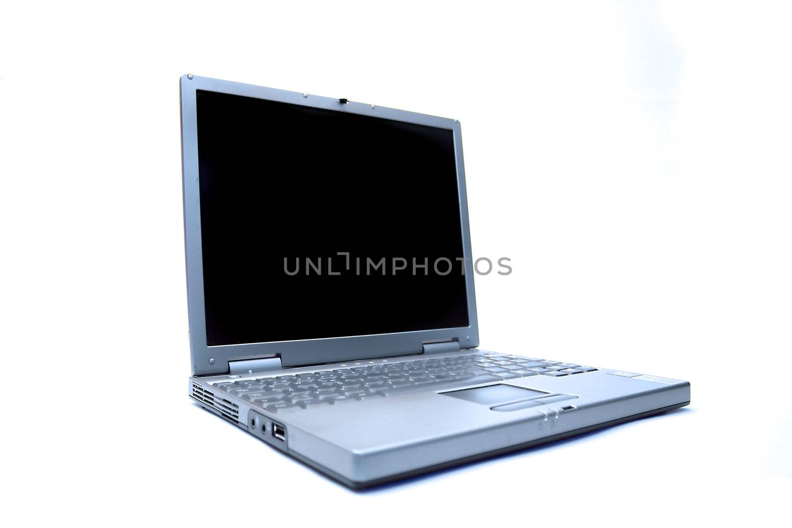 A simple notebook computer. All isolated on white background.