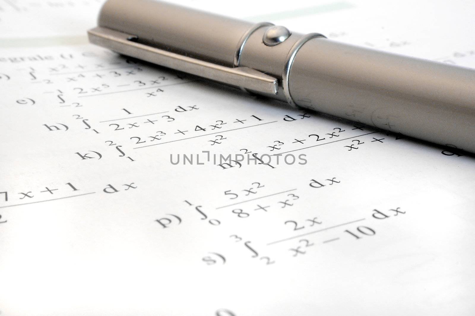 Some difficult formulas beside a silver biro
** Note: Slight graininess, best at smaller sizes.