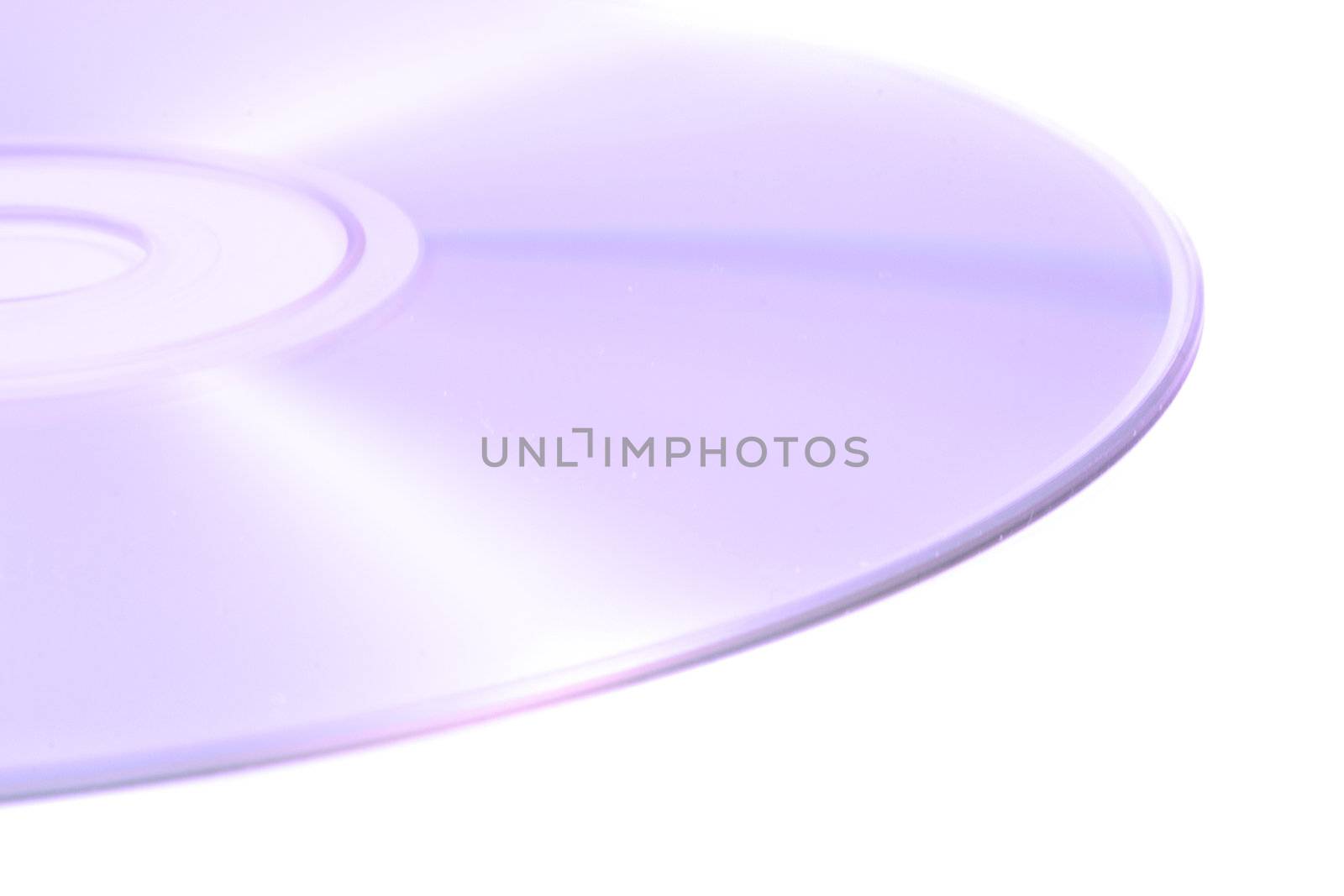 A closeup view of a light shiny compact disk used for data storage on a white background.