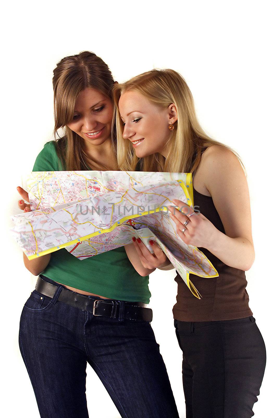 Two young handsome women on sightseeing tour. All isolated on white background.