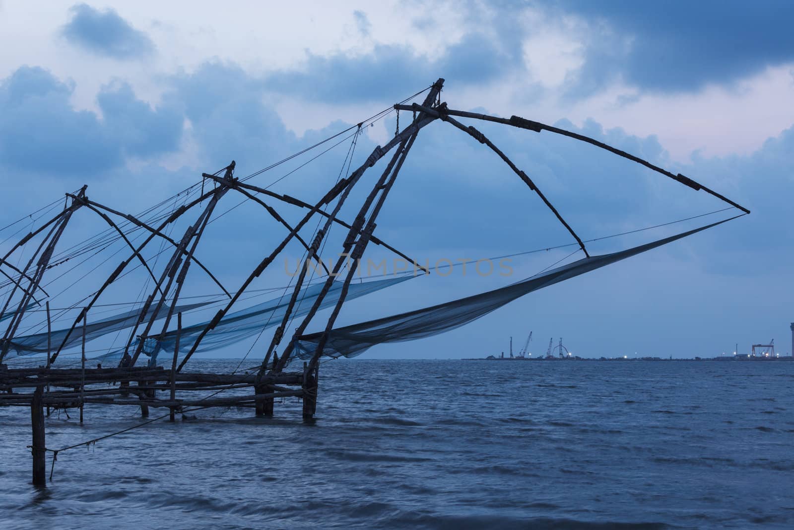 Kochi chinese fishnets in twilight. Fort Kochin, Kochi, Kerala, India