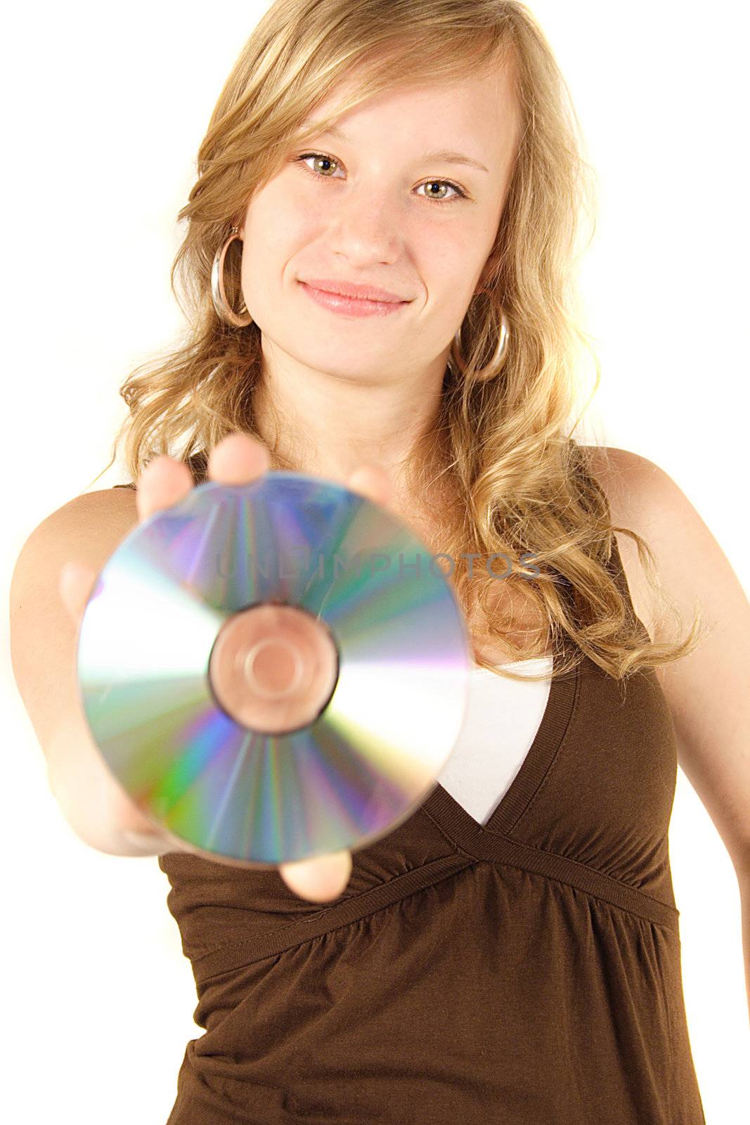 A young woman holding a cd or dvd. All isolated on white background.