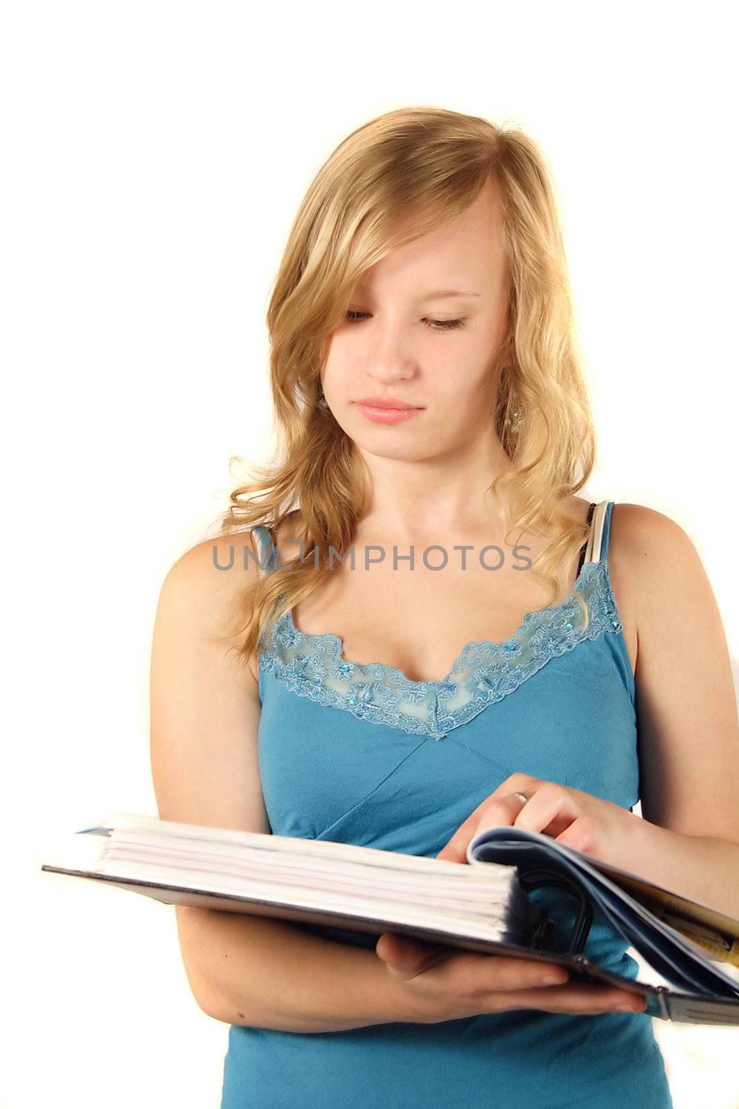 A young ambitious student reading. All isolated on white background.