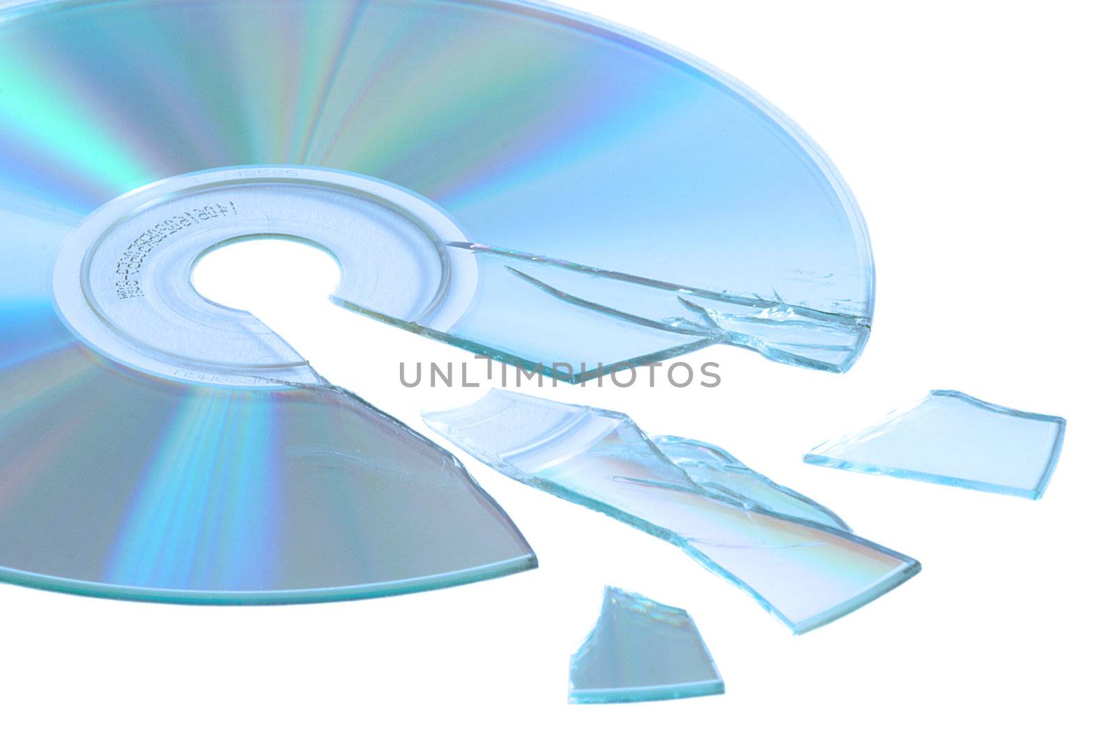 A shattered cd or dvd isolated on white background.