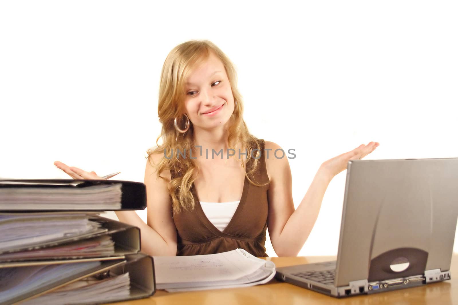 A young smarting woman at her workplace. All isolated on white background.