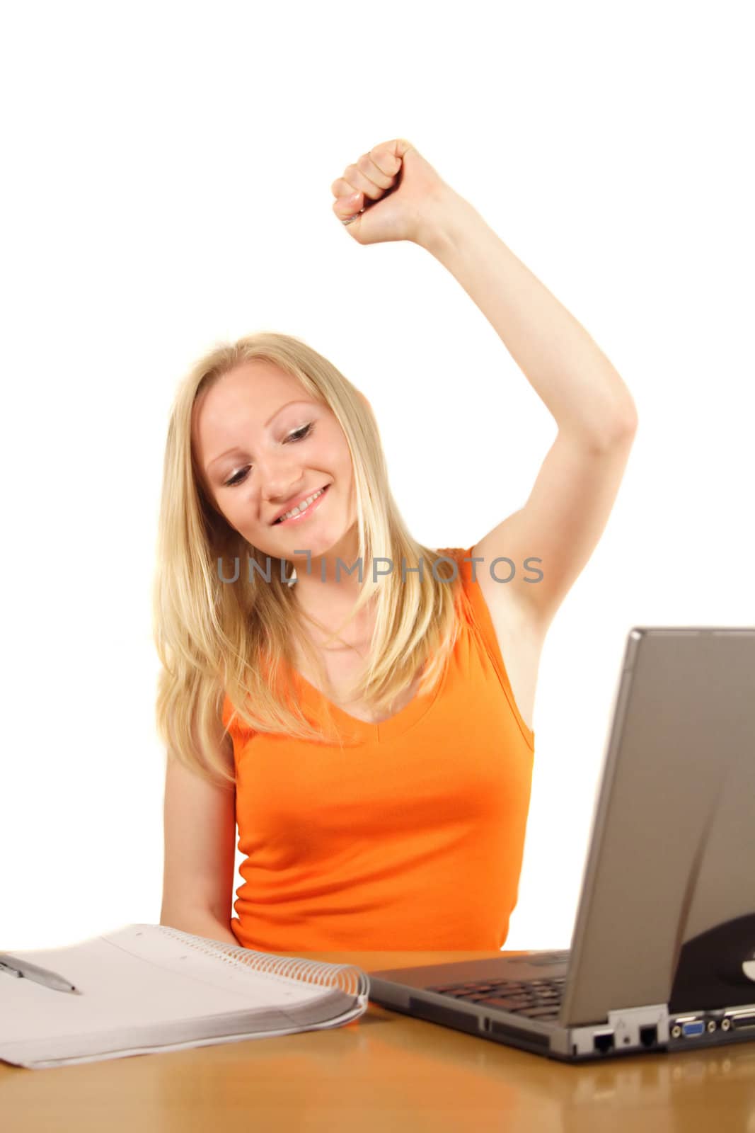 A young handsome student jubilating at her workplace. All isolated on white background.