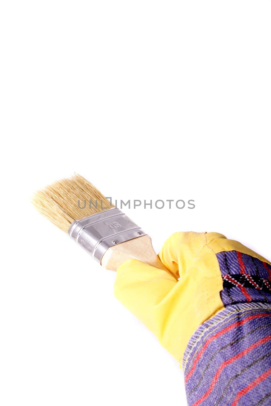 A hand in gauntlet painting a wall. All isolated on white background.