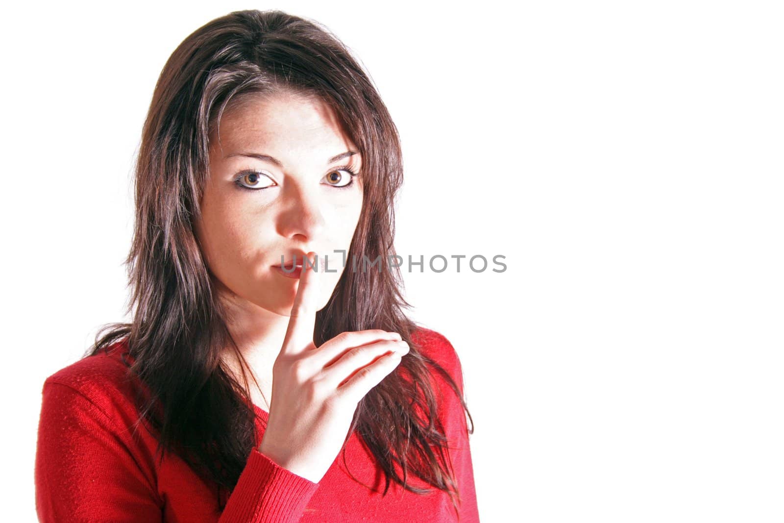 Attractive young woman asks for silence. All on white background.