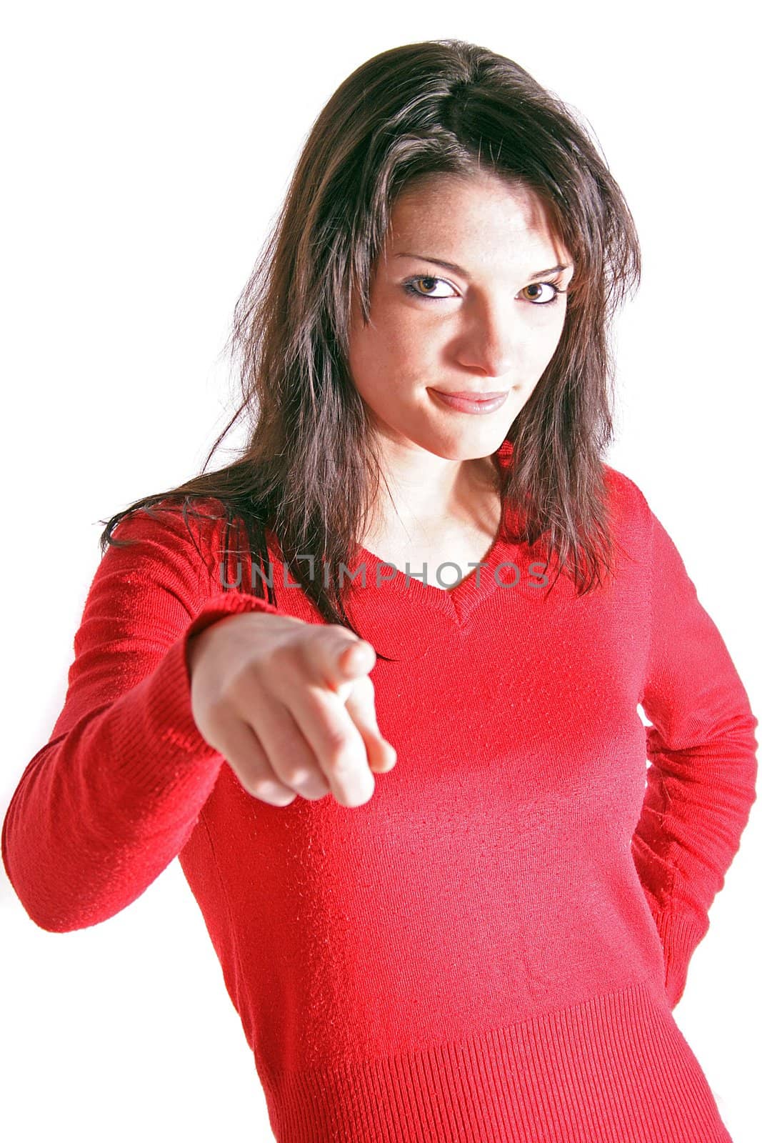 Attractive young woman pointing with finger. All on white background.