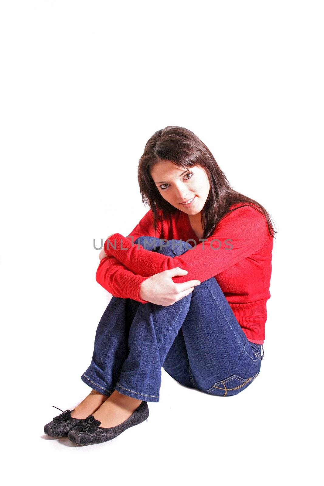 Worried young woman. All on white background.