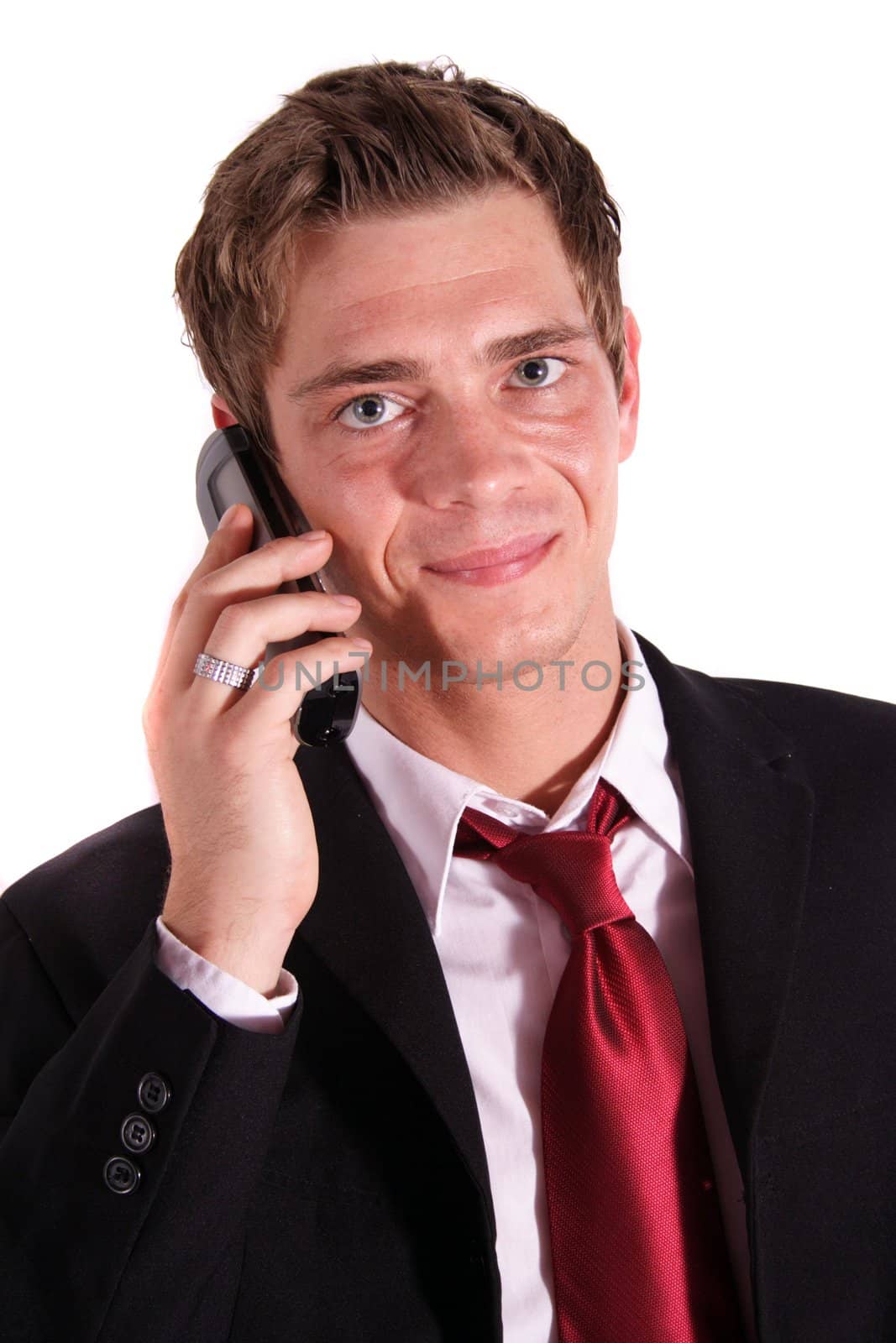 A smart businessman making a call. All isolated on white background.