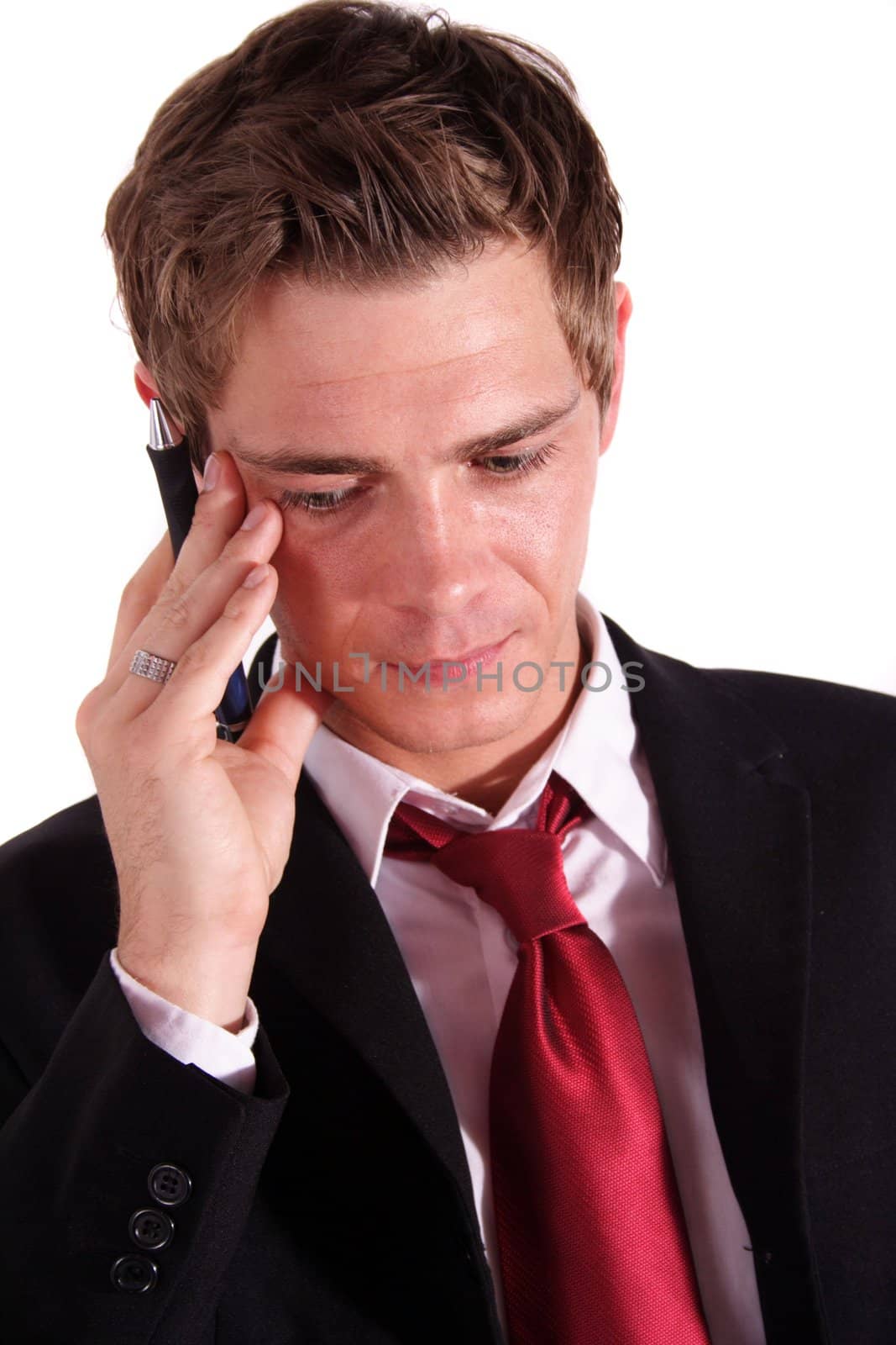 A smart businessman thinking of something. All isolated on white background.