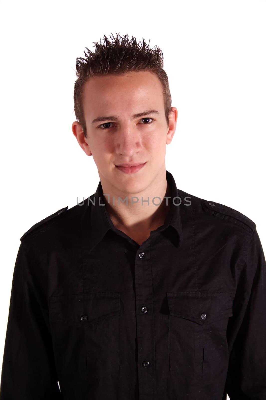 A young handsome man standing in front of a white background.