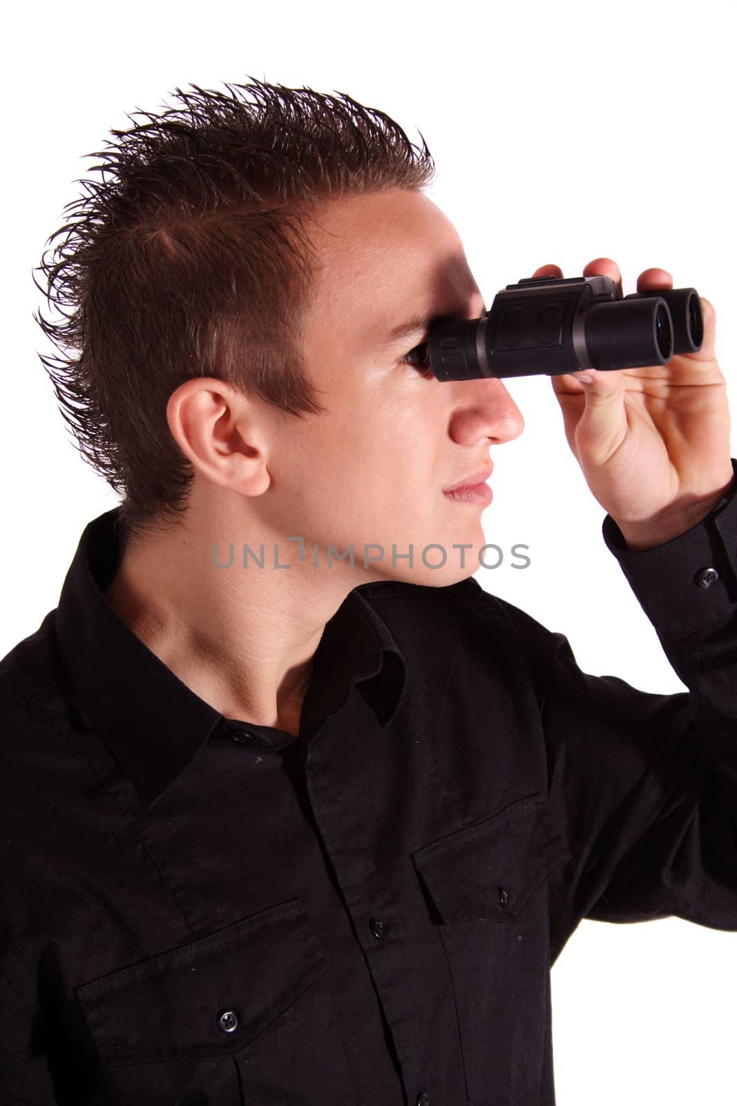 A young man using binoculars. All isolated on white background.