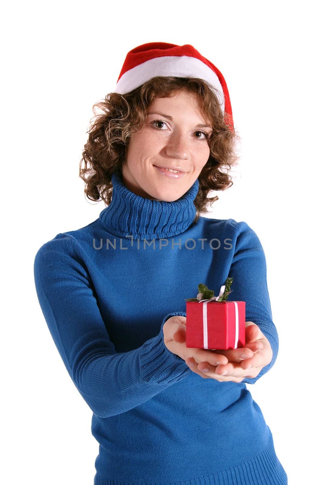 A handsomeyoung woman holding a small red present. All isolated on white background.