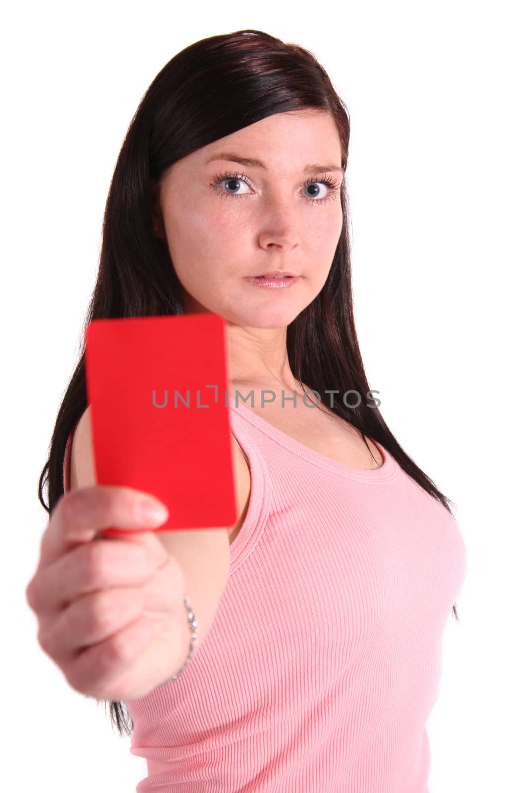 A handsome young woman shows someone a redcard. All isolated on white background.