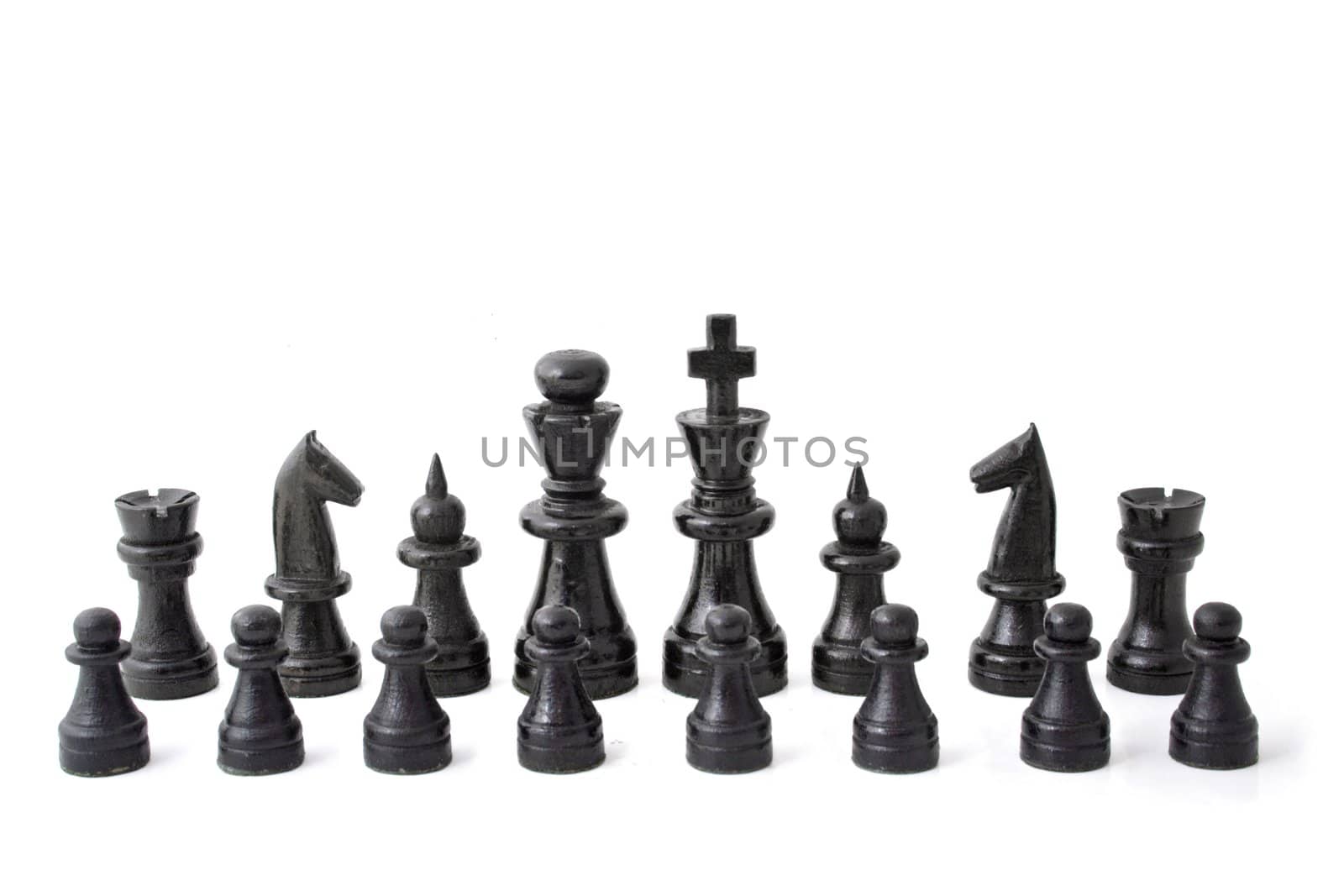 Chessmen standing side by side. All isolated on white background.