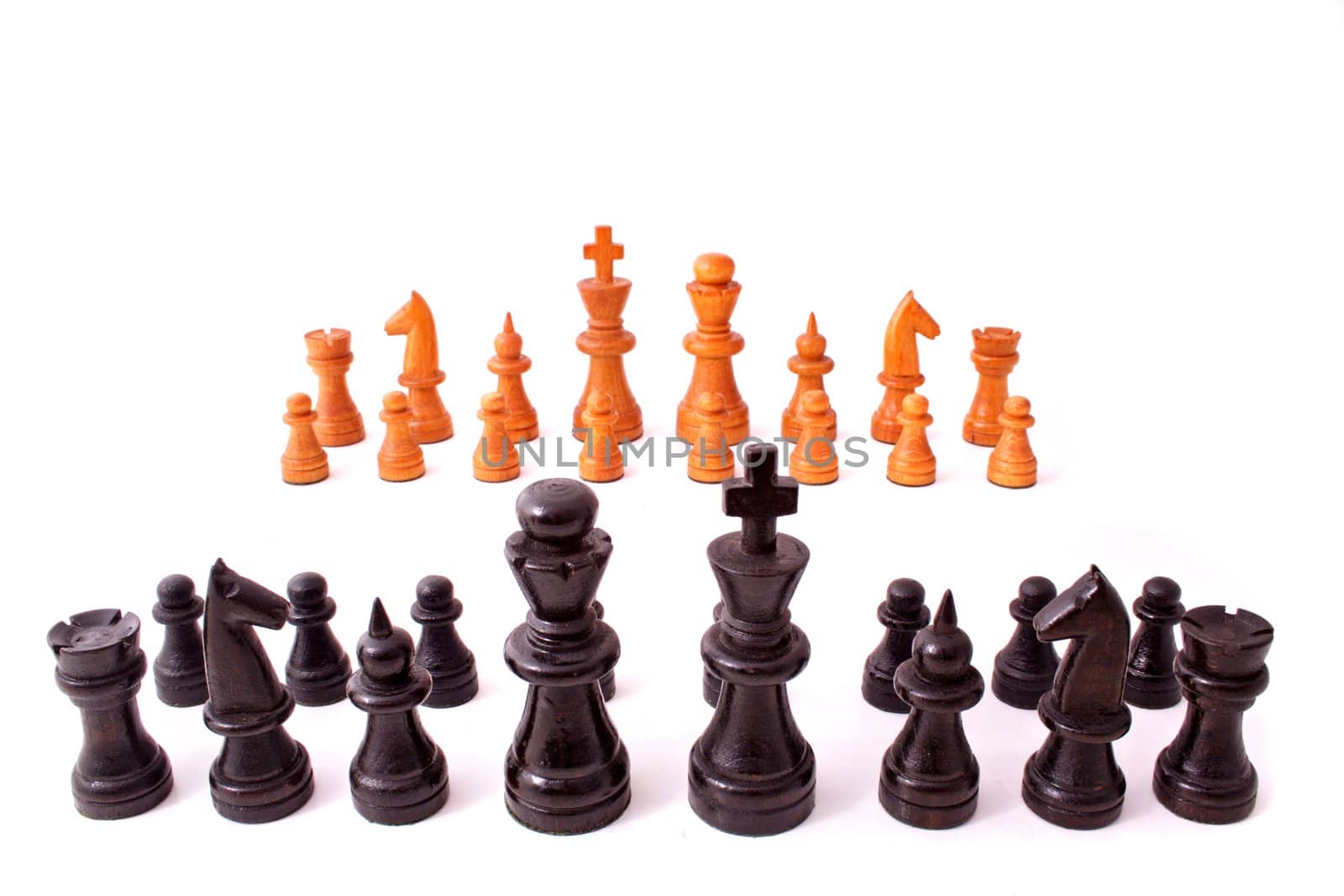 Chessmen standing side by side. All isolated on white background.