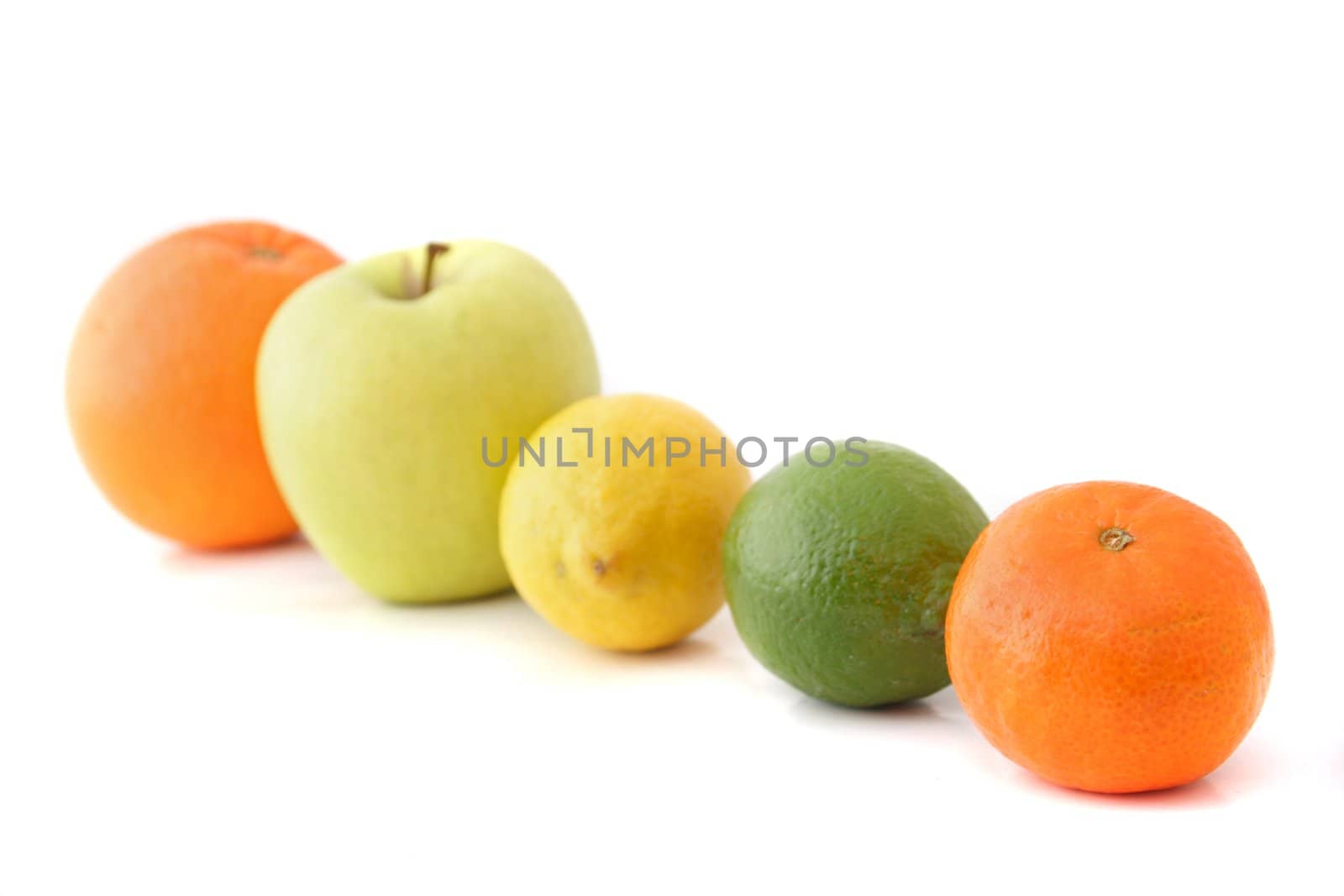 A line of various fruits. All isolated on white background.
** Note: Shallow depth of field.