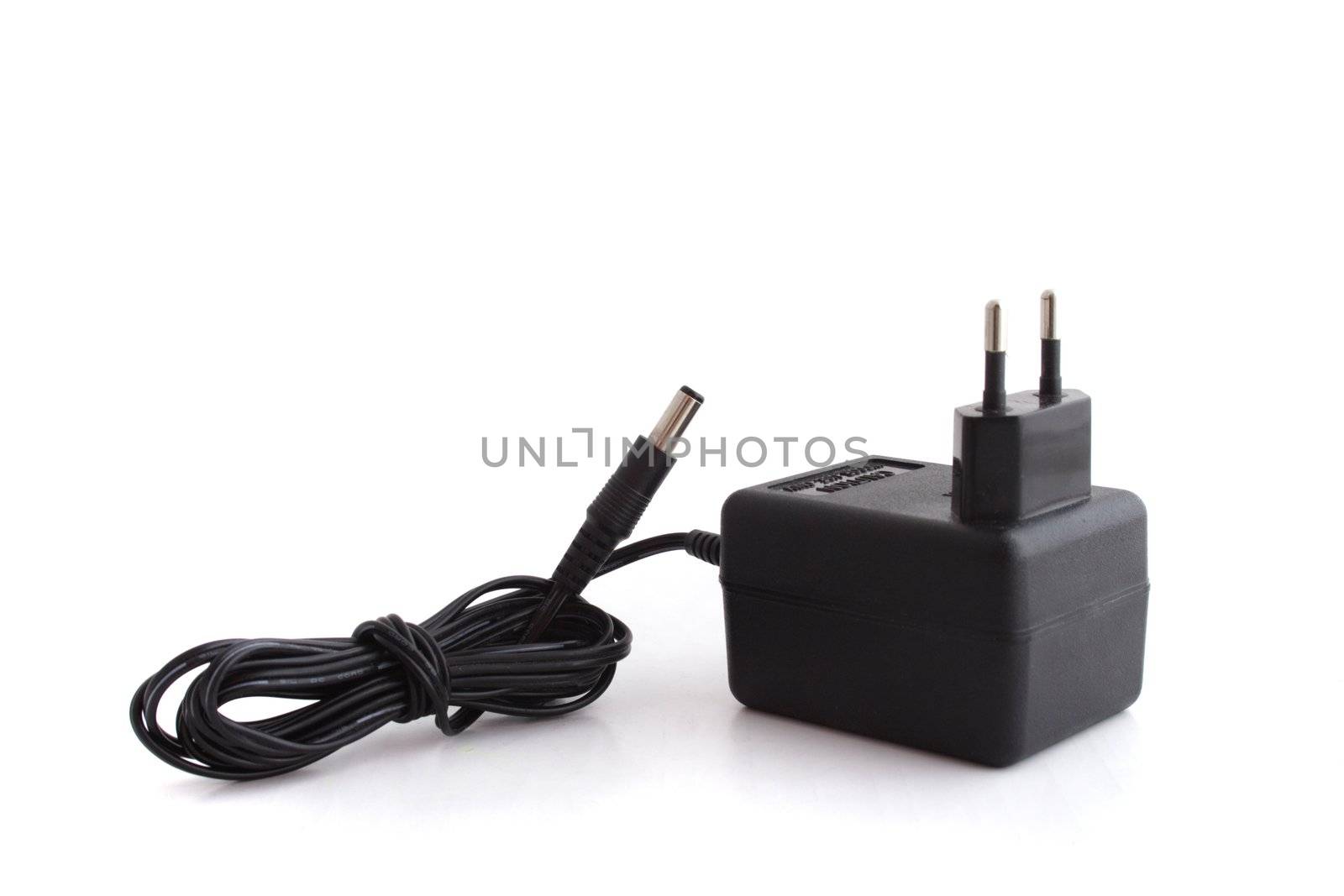 A simple power supply unit. All isolated on white background.
** Note: Shallow depth of field.