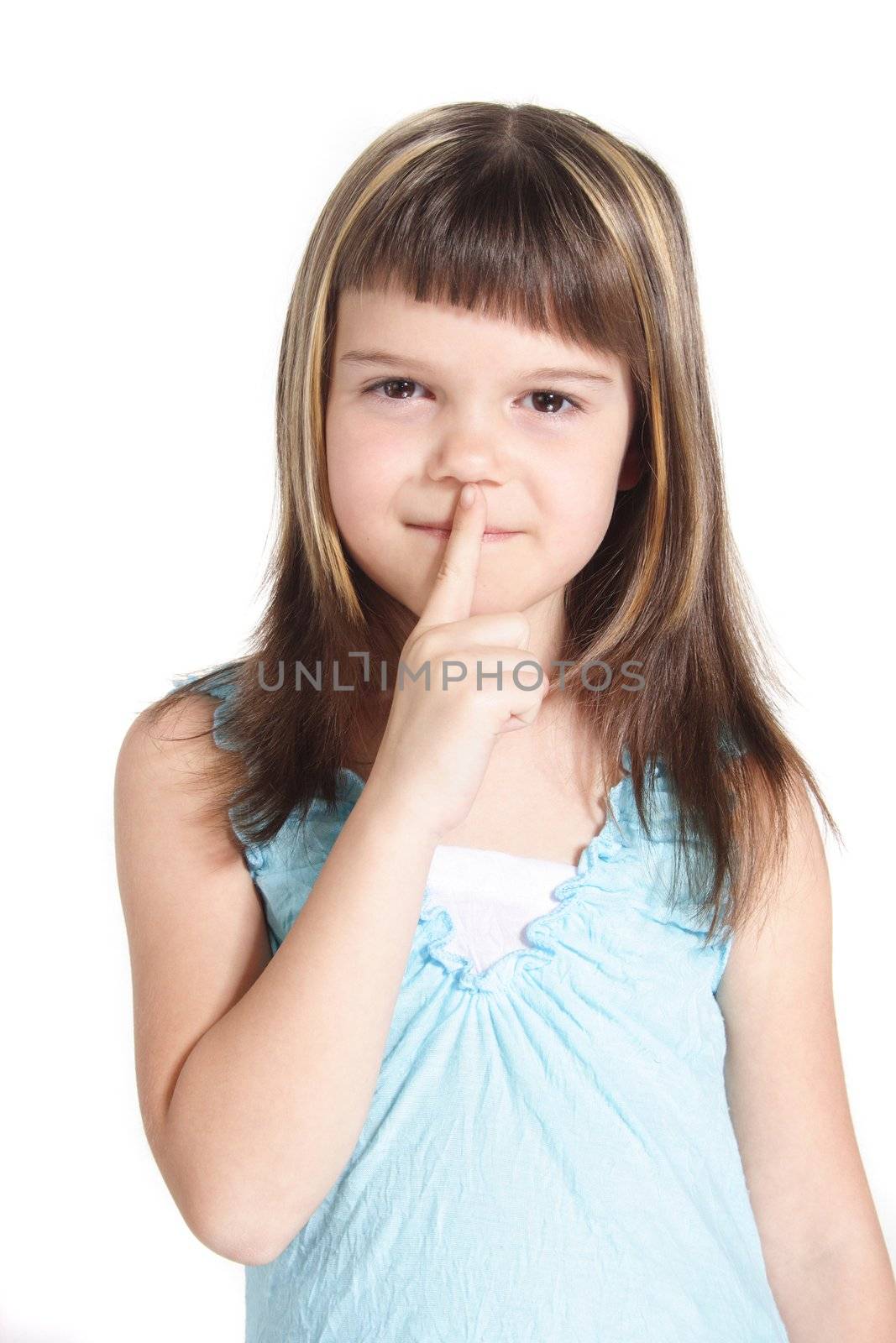 A young girl requests silence. All  isolated on white background.