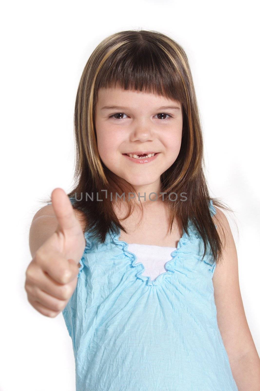 A young girl making a positive gesture. All isolated on white background.