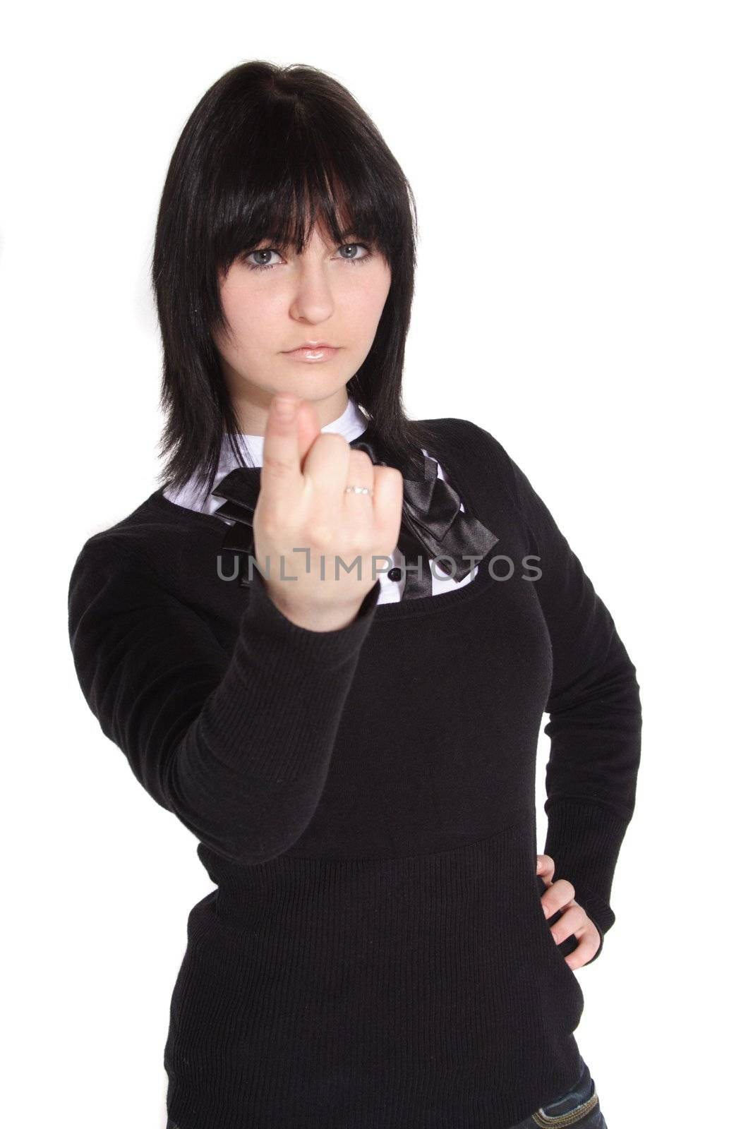 A handsome young woman making a threatening gesture. All isolated on white background.