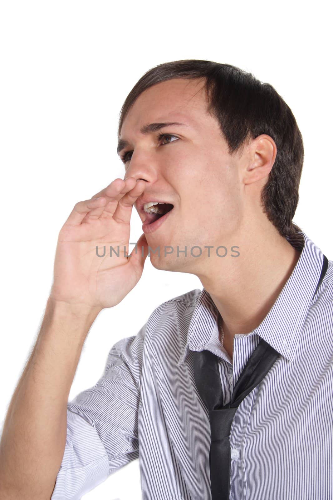 A handsome young man yelling. All isolated on white background.