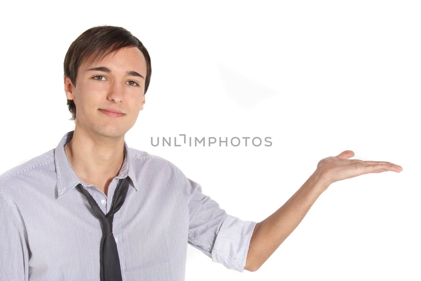 An attractive young man presents something. All on white background.