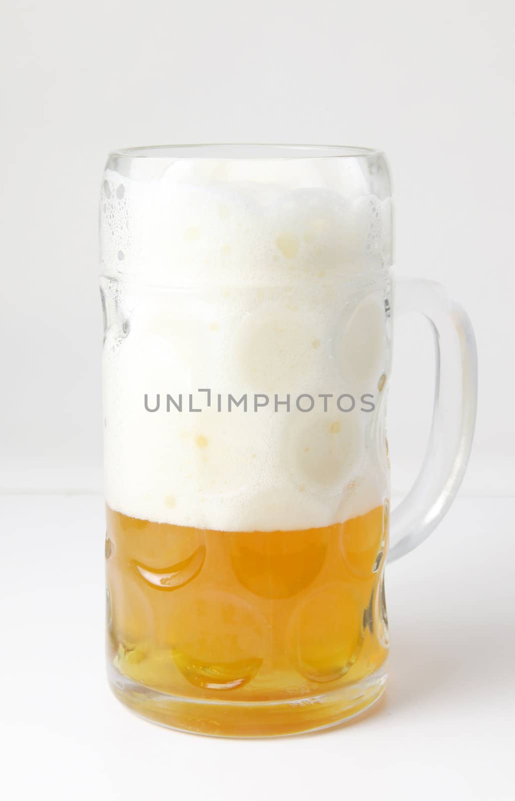 A typical bavarian beer glas. All on white background.