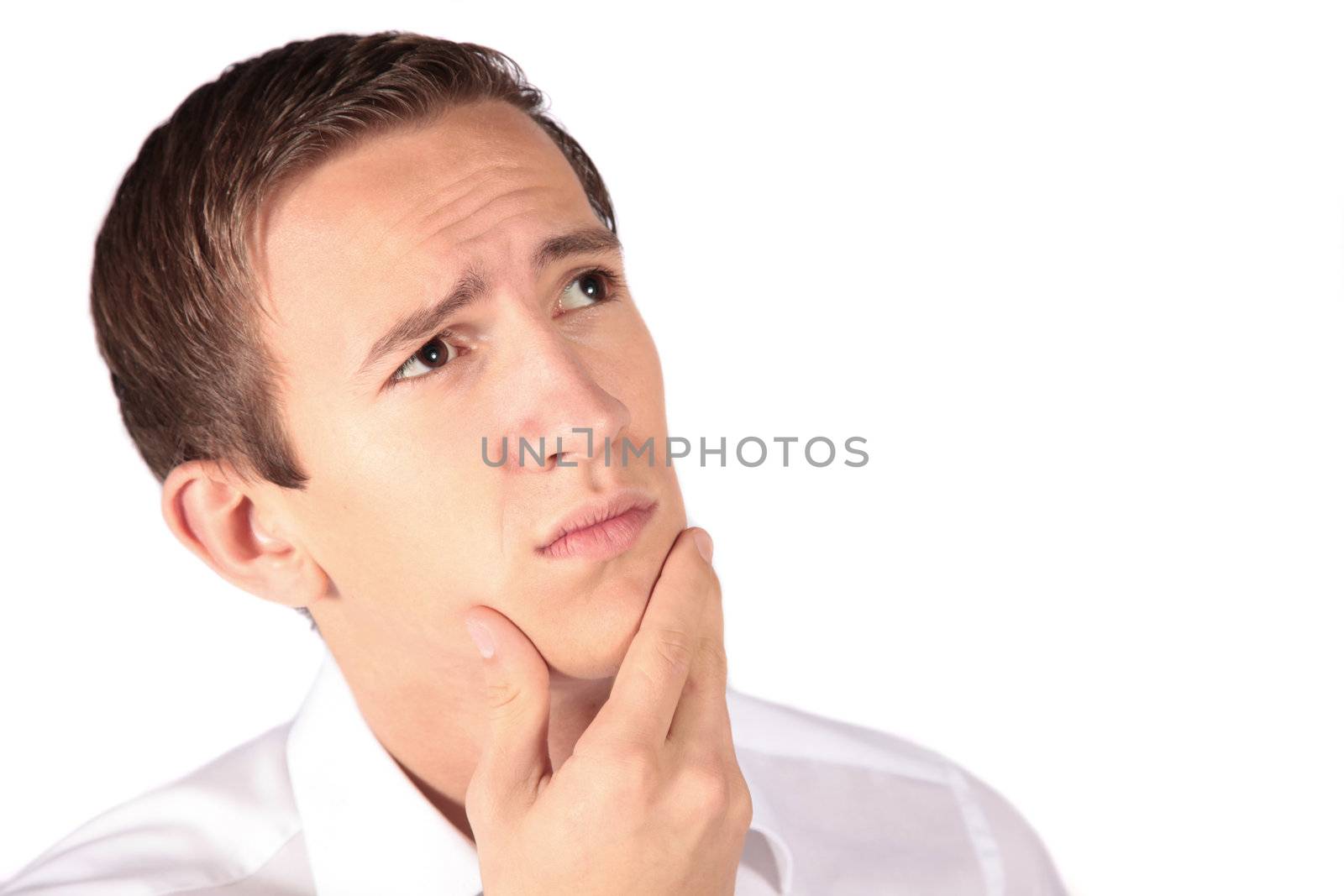 A handsome young man deliberates a decision. All isolated on white background.