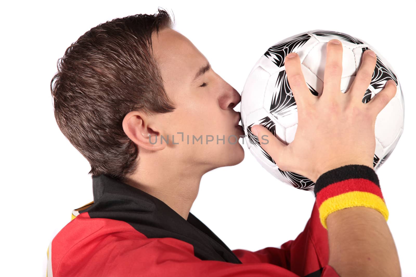 A young german soccer fan.All isolated on white background.