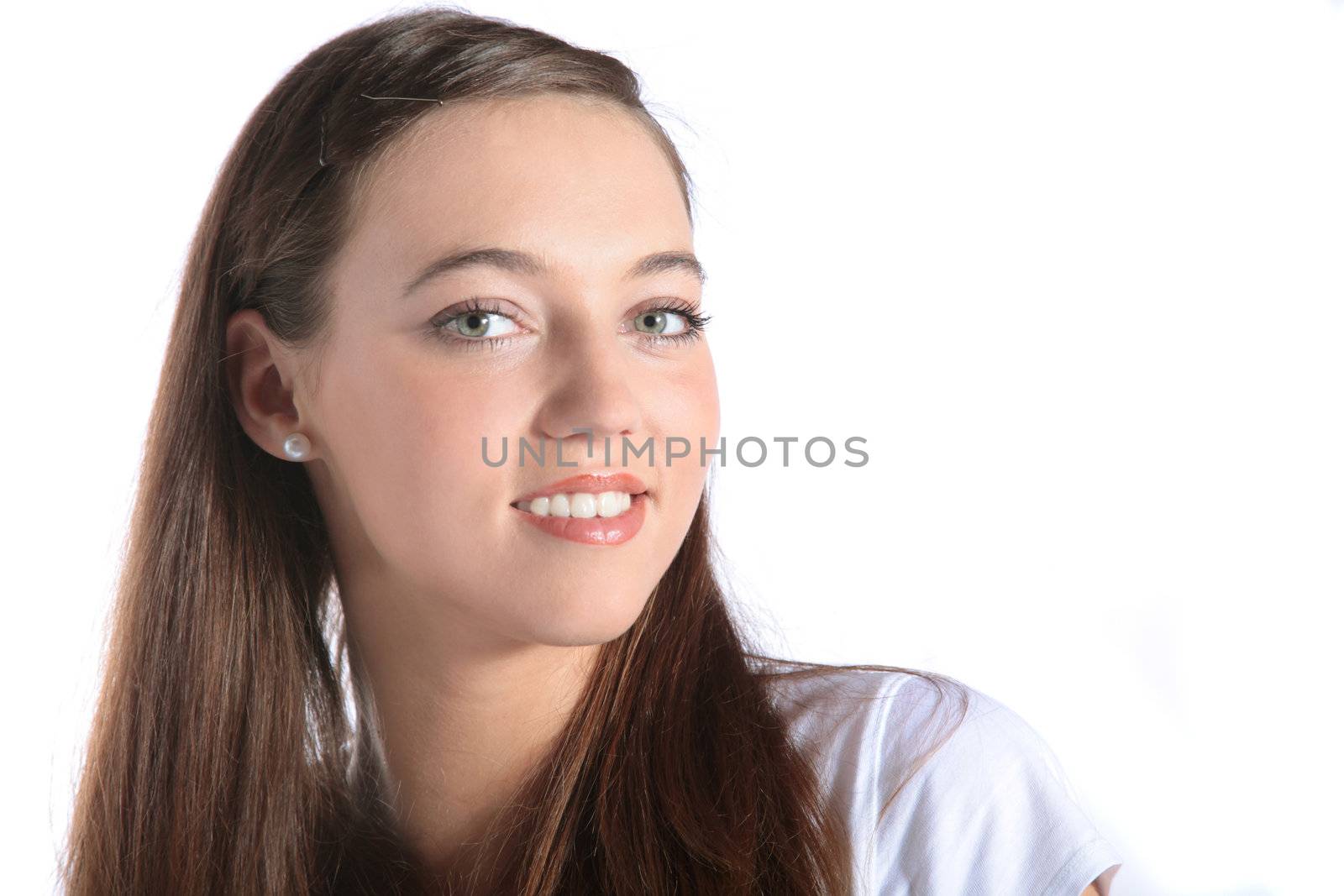 An attractive young woman smiling. All isolated on white background.