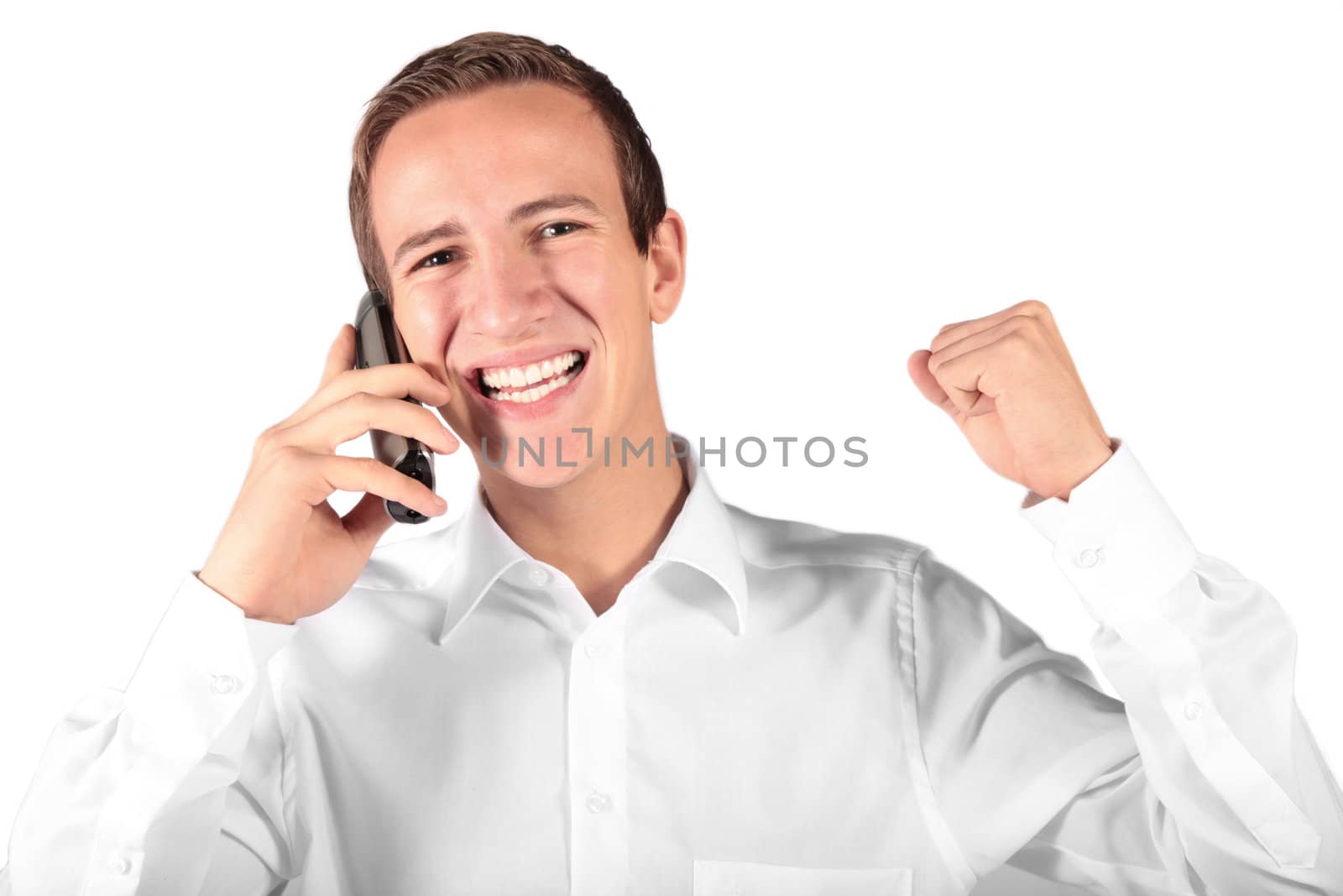 A young attractive man gets a pleasant call. All isolated on white background.