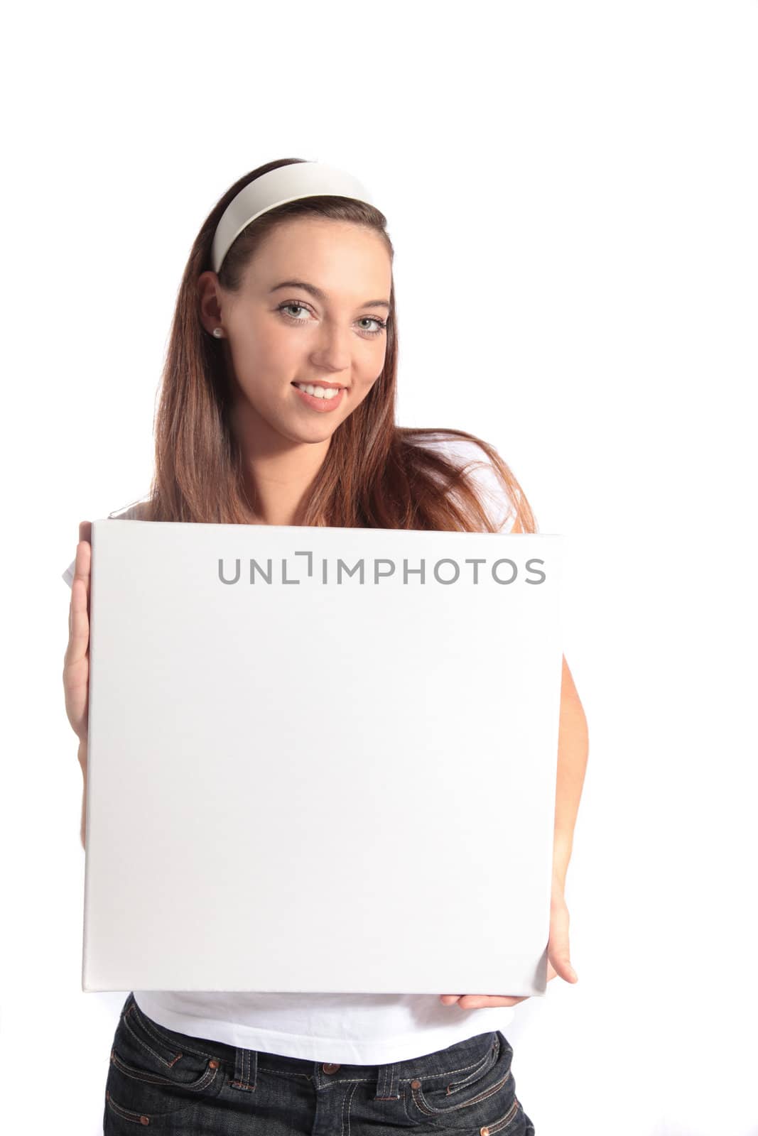 An attractive young woman holding a white board. All isolated on white background.