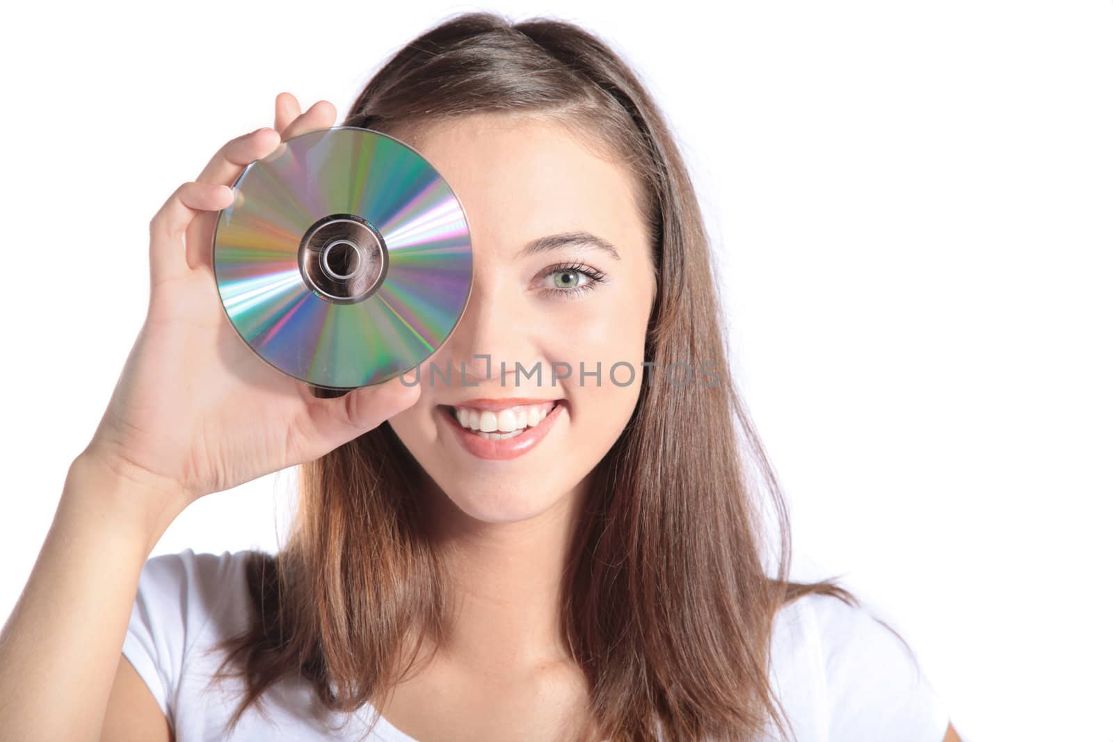 An attractive young woman holding a CD-Rom or DVD.  All isolated on white background.