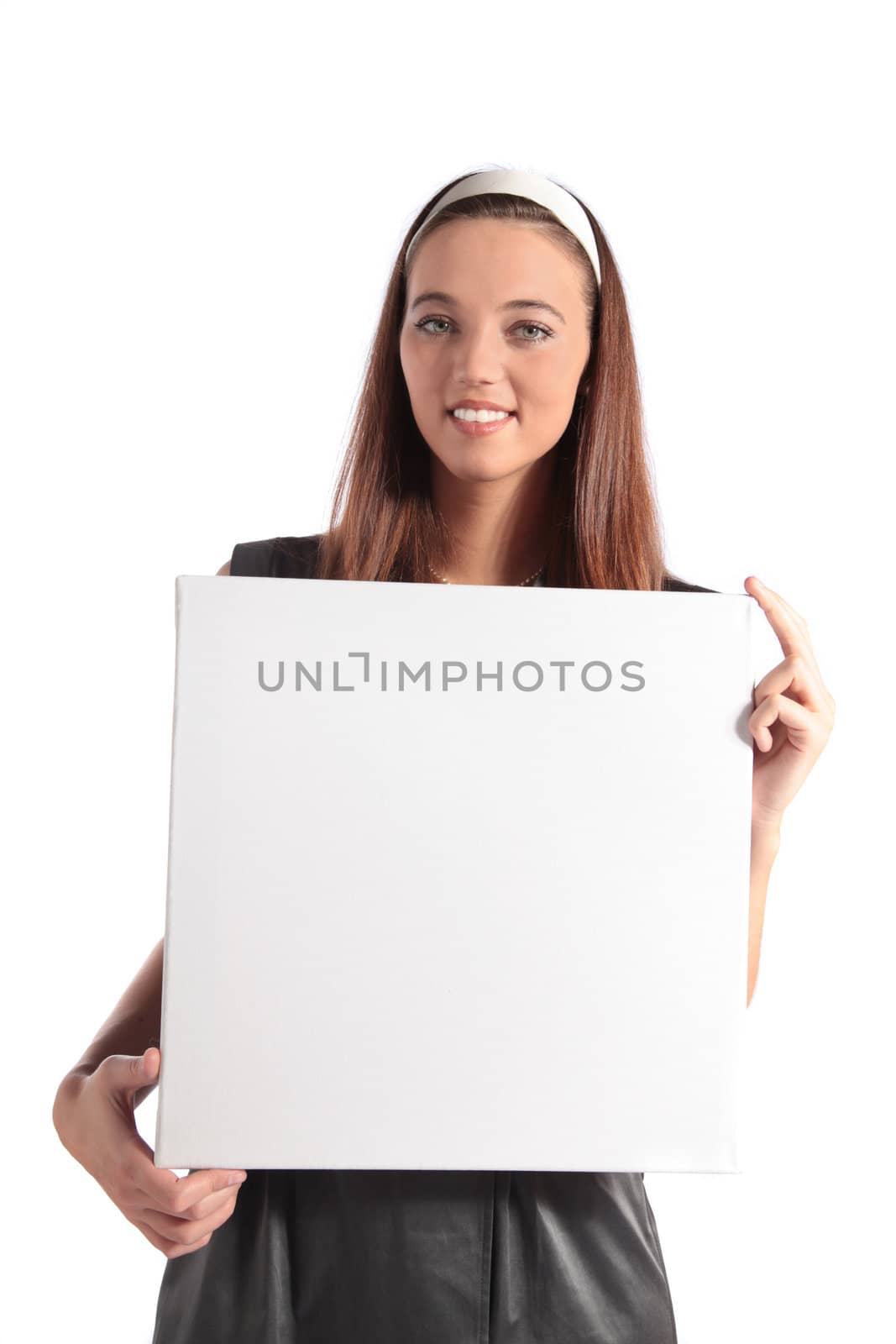 An attractive young woman holding a white board. All isolated on white background.